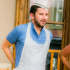 A man in a chef hat and apron