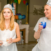 Two women in aprons and chef hats
