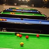 A line of pool tables