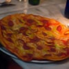 Close up of a pizza on a plate