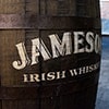 The side of a whiskey barrel saying Jameson Irish Whiskey