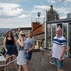 People stood on the roof of an apartment in Prague