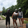 Three girls with their helmets on