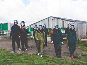 LNOF staff walking towards the camera with helmets on, at Fury Events