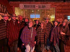 Team LNOF dressed as cowboys as Moonshine Saloon 