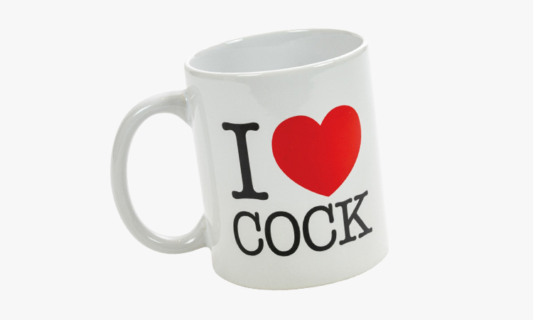 White mug with I heart cock on it