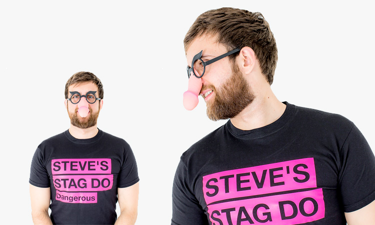 Two men wearing willy glasses