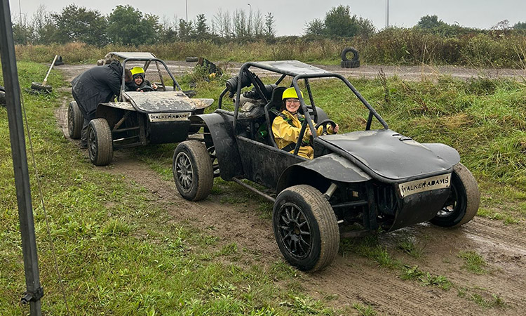 Two people in rage buggies at Max Events in Bristol