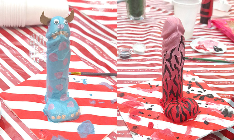 A penis painted as sully from monsters inc and a penis painted with an ombre of pink and zebra stripes