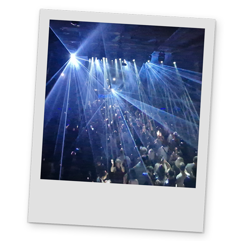 A polaroid style image of the interior of a nightclub