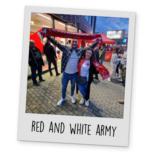 A polaroid style image of Two of Team LNOF posing in front of the football stadium, with text reading 'Red And White Army' at the bottom