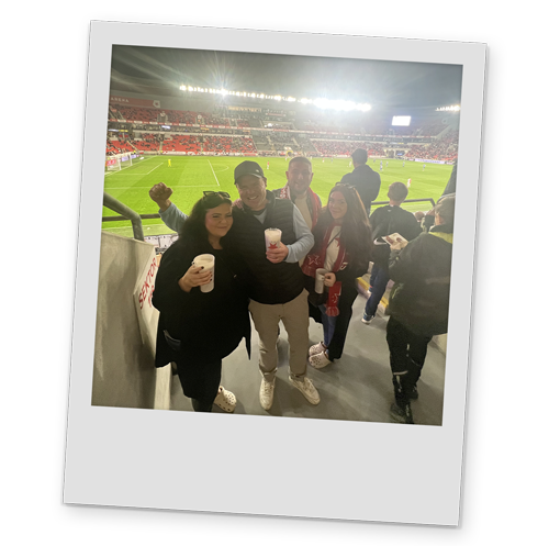 A polaroid style image of Team LNOF in the football stadium