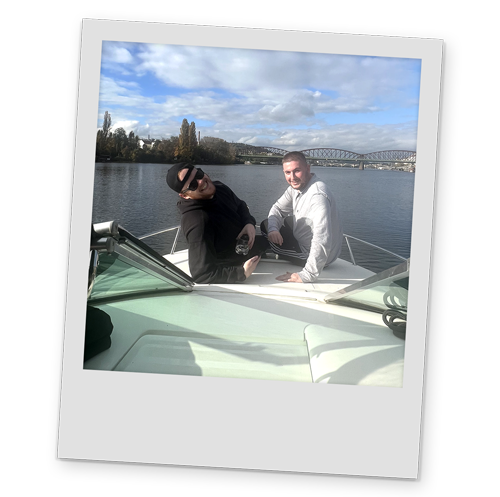 A polaroid style image of two of Team LNOF on the river cruise