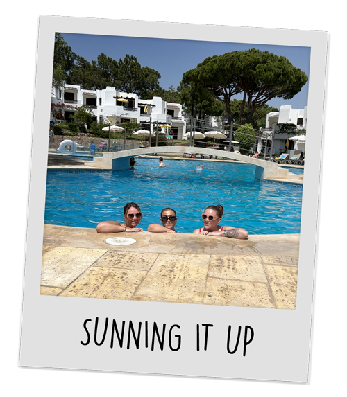 3 members of LNOF staff sunning it up in the pool at the hotel