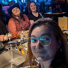  Female members of LNOF staff posing for camera in Be At One bar 