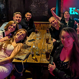  Team LNOF posing for the camera in Coyote Ugly bar 