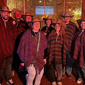  LNOF staff in cowboy hats and ponchos 