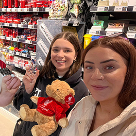  Adam, Zoe and Christie posing with Liverpool souvenirs 