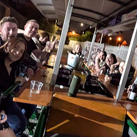  Team LNOF all sat on a beer bike 