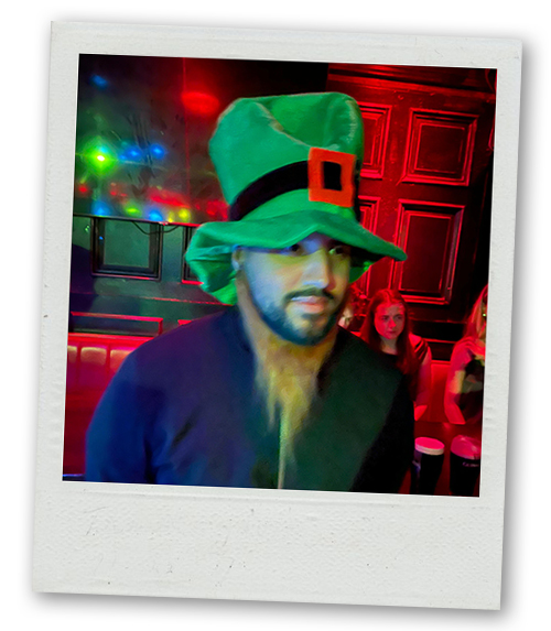 Akash wearing a green Irish hat and a ginger beard in Copper Face Jacks