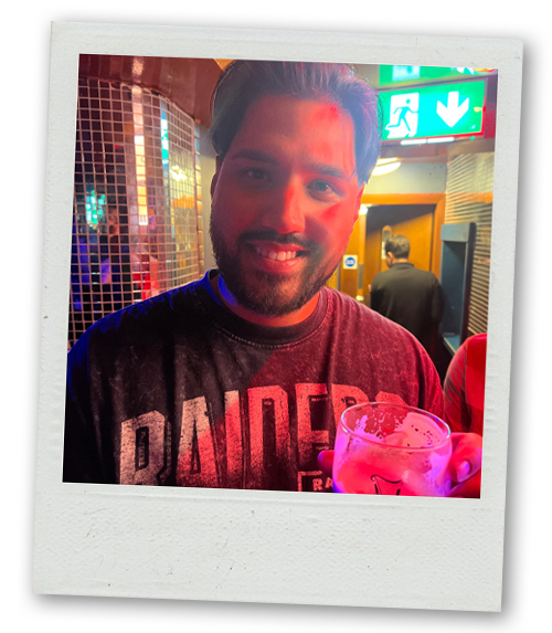 Akash drinking a Guinness