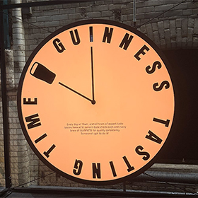  A clock in the Guinness Factory Tour that reads Guinness Tasting Time 