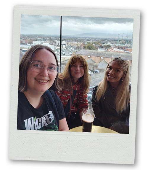 Hannah, Rebekah and Billie drinking Guinness in the Gravity Bar at the Guinness Factory Tour