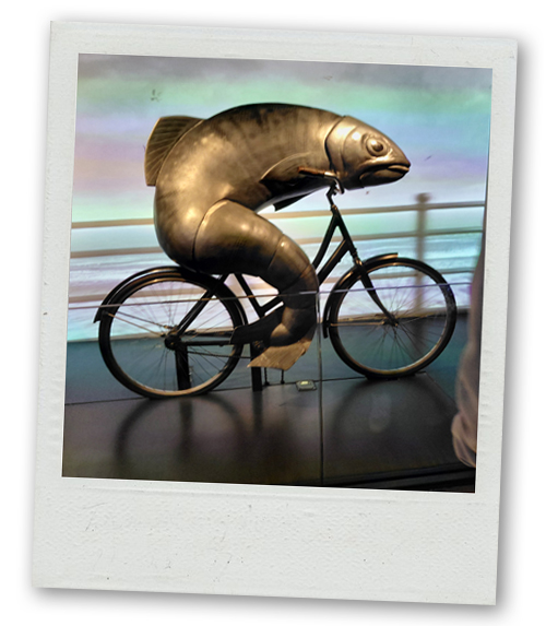 A statue of a fish on a bicycle at the Guinness Factory Tour