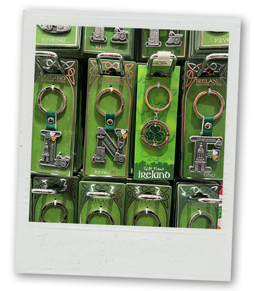 Some Irish keyrings arranged to read LNOF