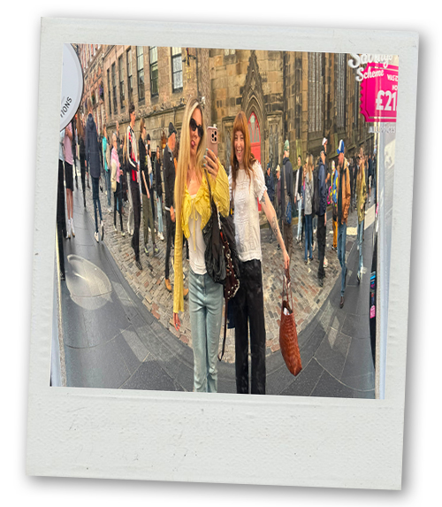 Becky and Rebekah taking an optical illusion pic on the streets of Edinburgh