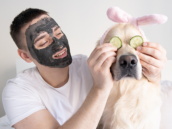 Retriever with cucumbers on eyes taking part in a spa day. Dog Stag do activity #8