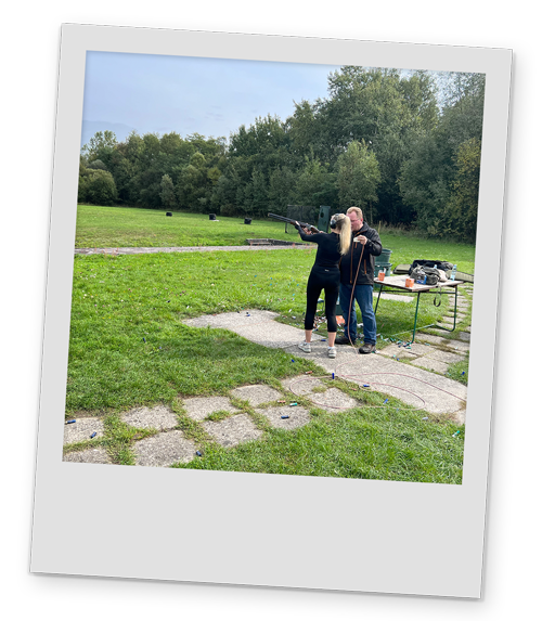 A polaroid style image of one of Team LNOF doing Clay Pidgeon Shooting in Krakow