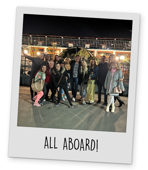 A polaroid style image of Team LNOF and the ground team in Krakow, with text reading 'All Aboard!' at the bottom