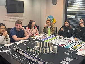 Team LNOF smelling different scents at the perfume making workshop 
