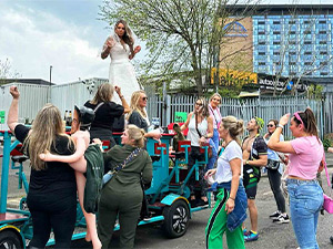 A hen group doing a beer bike in Newcastle 
