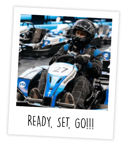A Polaroid of a man who is go karting which has been captioned with Ready, Set, Go!!
