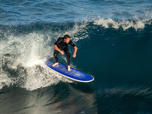 A man who is surfing in Benidorm 