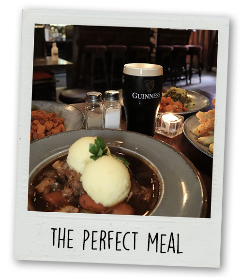 A Polaroid of a traditional Irish meal and a Guinness with the caption The Perfect Meal