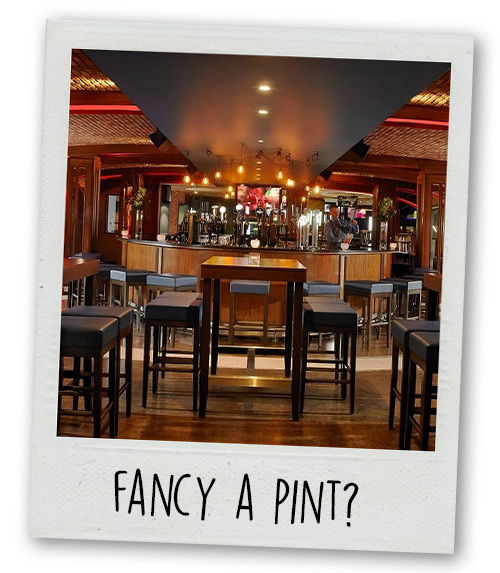 A Polaroid of Buskers on the ball with the caption Fancy A Pint?