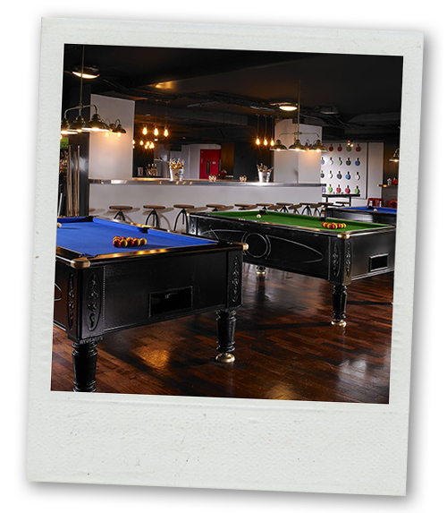 A Polaroid of two pool tables at Buskers on the ball