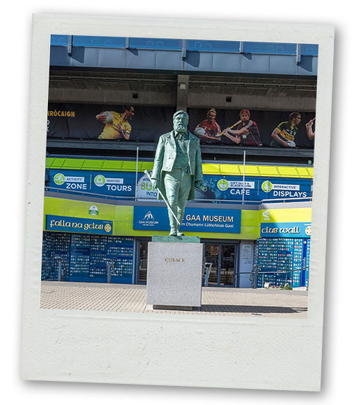 A Polaroid of a statue of a man outside the GAA museum