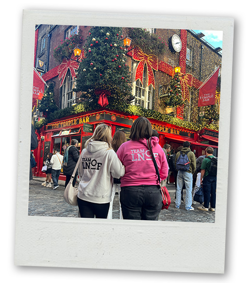 A Polaroid of two members of LNOF staff looking at Temple Bar