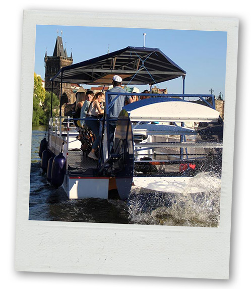 A Polaroid of a back view of a pedal beer boat