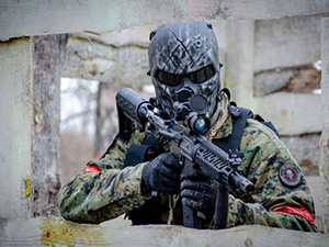 A man on a stag do in Prague doing paintball 