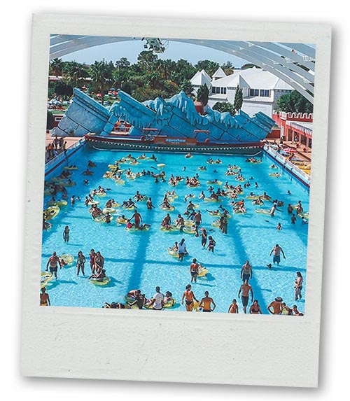 A Polaroid of a large swimming pool