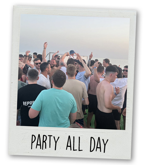 A Polaroid of a group of men on a boat with the caption Party All Day