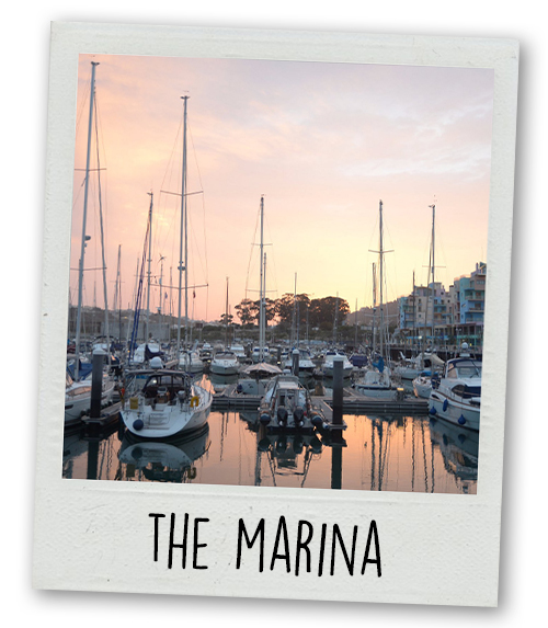 A Polaroid of Albufeira's marina with the caption The Marina
