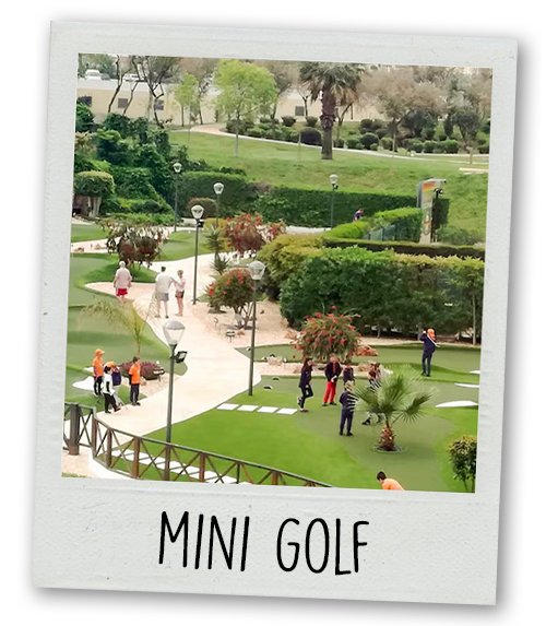 A Polaroid of a mini golf course with the caption Mini Golf