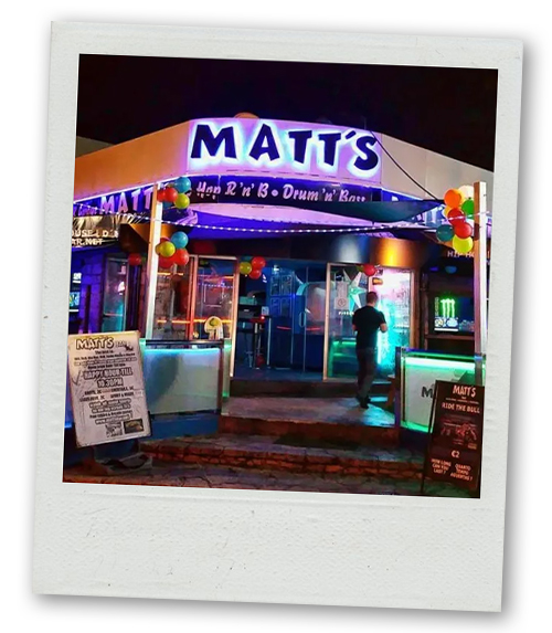 A Polaroid of a bar on the strip called Matt's