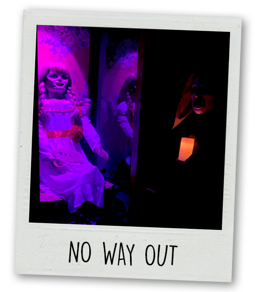 A Polaroid of a creepy doll in an escape room with the caption No Way Out